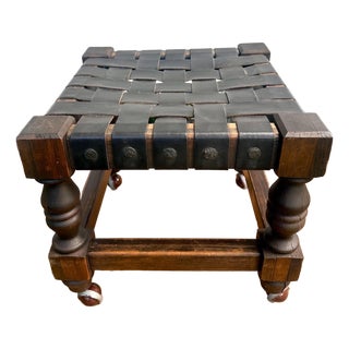 Vintage Spanish Revival Woven Leather Strap Rolling Footstool For Sale