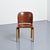 Set of six chairs by Bruno Rey, a variation of the Rey Chair model. The varnished solid oak base supports a seat and back...