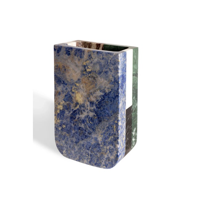 Vase in black Marquinia, white Michelangelo, Arabescato Vagli Filo Rosso, green Guatemala and Blue Sodalite marbles. Size:...