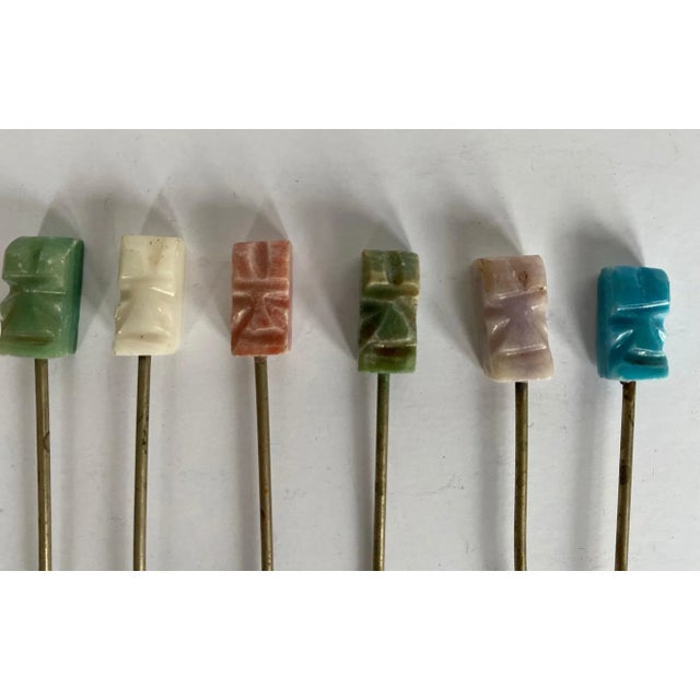 Set of 8 Easter Island Moai head statue hors d'oeuvres or cocktail picks. Each head is carved from different color of...