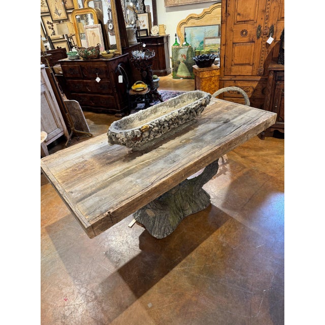 French faux bois table with concrete base and bleached wood top. 65” x 33”d x 30”h 47-025