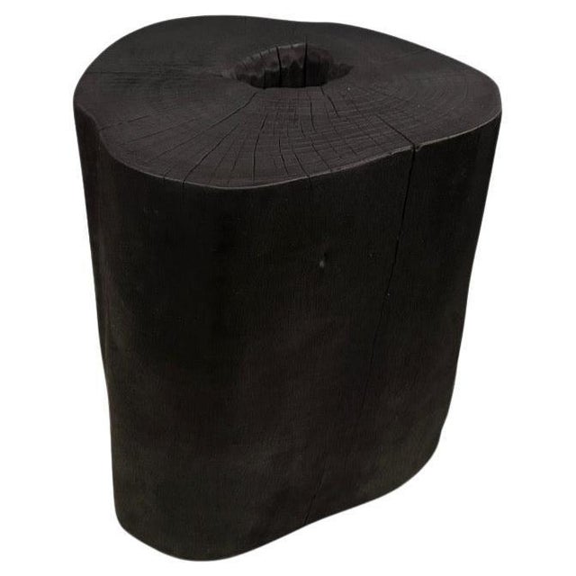 Reclaimed lychee wood side table. Charred, sanded and sealed whilst respecting the natural organic shape and revealing the...