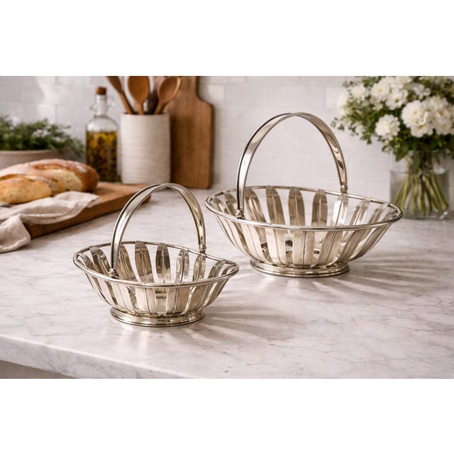 Vintage silverplate swing handle baskets with openwork slatted design, perfect for tabletop serving, bread presentation,...