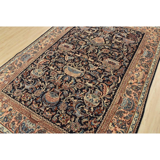 An authentic vintage traditional Kashmar rug hand-knotted with fine wool and natural dyes. This finely woven oriental rug...