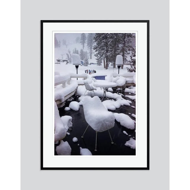 Squaw Valley Snow' by Slim Aarons Open Edition Snow covers the deserted cafe in Squaw Valley, California, January 1961....