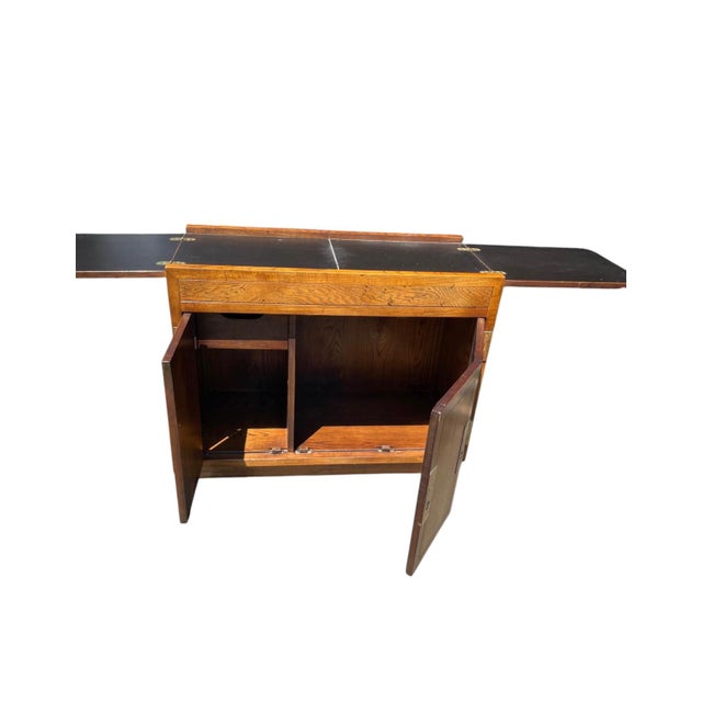 Vintage Henredon Scene One Campaign Flip-Top Server / Bar Cabinet A striking example of Henredon’s celebrated Scene One...