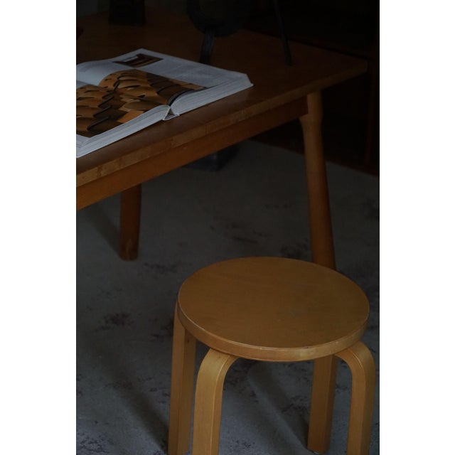 An amazing pair of stools in a lacquered birch. Designed by Alvar Aalto for Artek in Finland. Model "K60". This vintage...