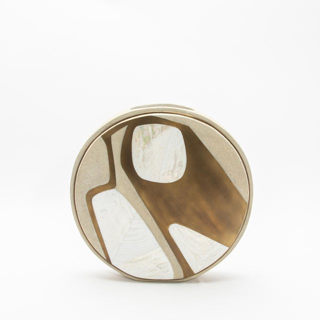 The Circular Cosmos vase by R&Y Augousti is a captivating fusion of natural textures and luxurious materials, handcrafted...