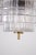 Beautiful 1960s brass and Bohemia crystal chandelier. The chandelier has a brass frame, its circular shaped shade has been...