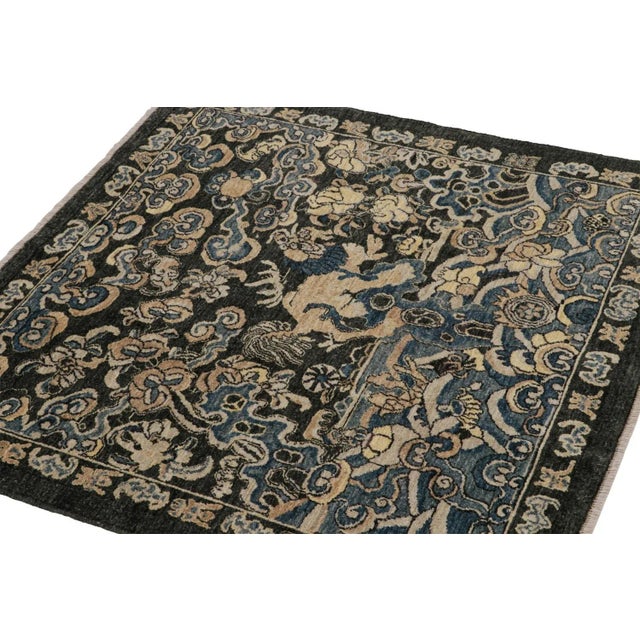 Hand-knotted in wool, this 4x4 square rug has been inspired by antique Chinese pictorial rugs—specifically animal rugs...