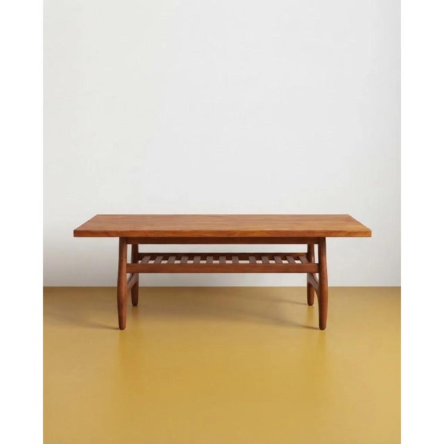 Vintage Swedish coffee table from the 1950s, with a teak top and beech frame. Measurements are being updated. Dimensions:...