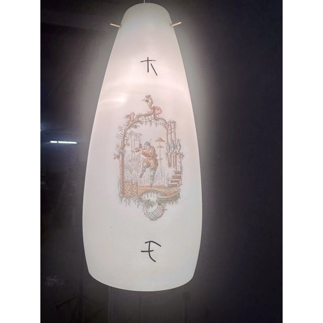 Suspension chandelier made in Italy in Murano, white opaline, with Japanese designs Up to 250V (Europe/UK Standard).The...