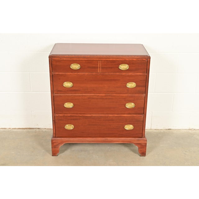 A gorgeous Georgian, Chippendale, or Federal style dresser or chest of drawers In the manner of Baker Furniture USA, Circa...