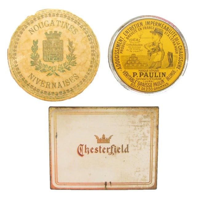 Collection of four French & American boxes and tins. The assortment consists of a Chesterfield cigarette box, a French...