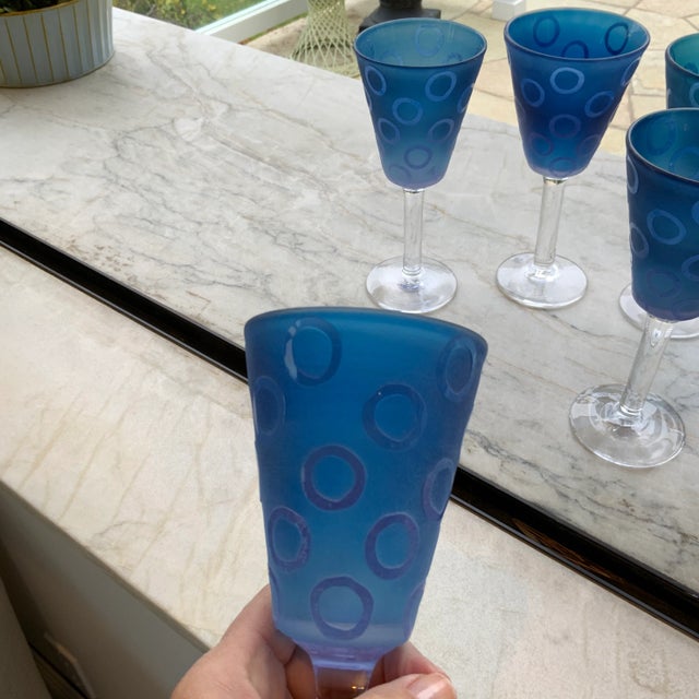 Beautiful set of nine frosted, in look and feeling, Murano glass wineglasses attributed to Mario Badioli with double M...
