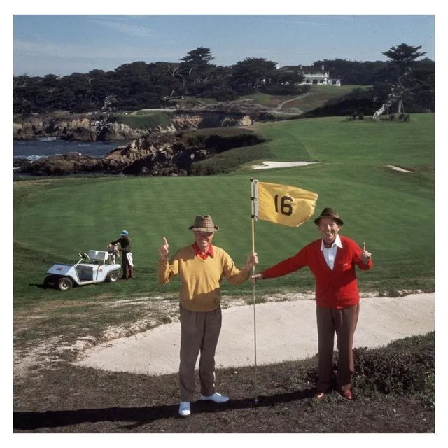 Golfing Pals 1961 At the 16th hole on Pebble Beach golf course, singer and film star Bing Crosby (in red) and A Thomas...