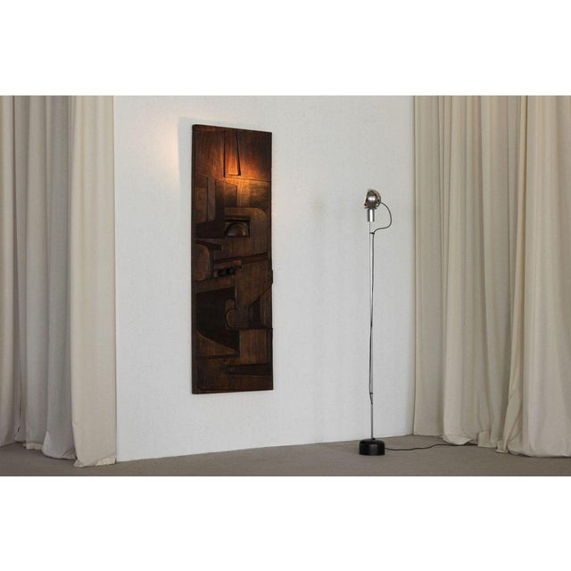 An exceptional example of italian modernist design, this elegant floor lamp (model 14002) was designed by angelo lelii and...