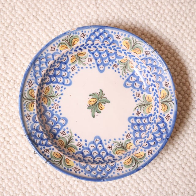 Add timeless Mediterranean charm to your collection with these 19th century Spanish pottery plates, beautifully...