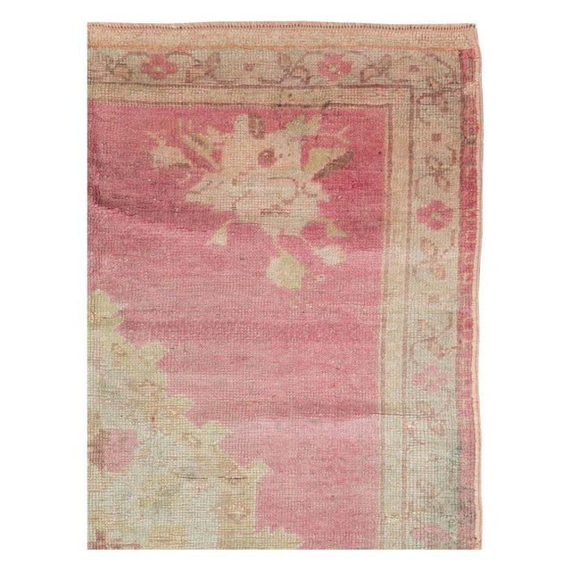 A vintage Turkish Oushak throw rug handmade during the mid-20th century. Measures: 3' 11" x 5' 4".