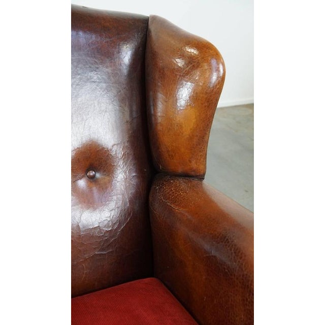 Vintage Leather Wing Chair with Red Corduroy Seat Cushion For Sale - Image 11 of 14