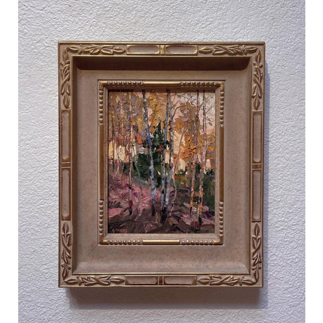 This oil on panel artwork depicts a serene stand of aspen trees, their slender trunks rising gracefully against a softly...