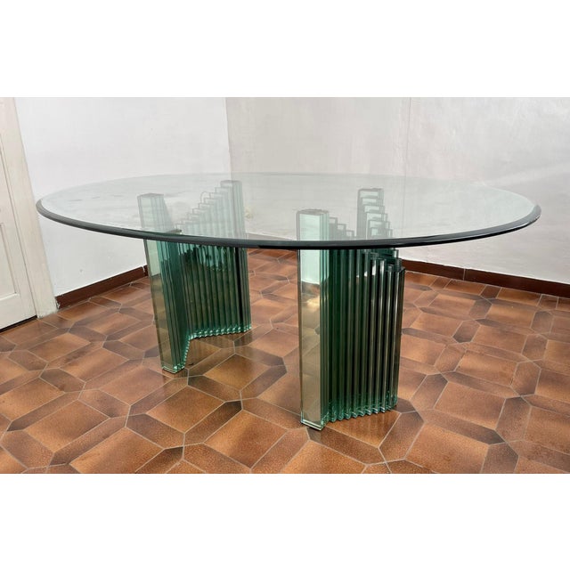 Table designed by Luigi Massoni for Gallotti & Radice. Elegant table entirely in aqua green crystal. The bow tie-shaped...