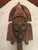 Kota reliquary guardian figure / Hand carved from solid wood and inlayed with copper bird figures and geometric patterns...