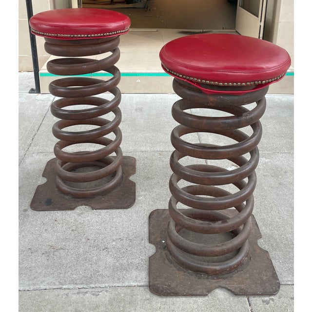 I couldn't love these more. It's fantastic pair of industrial spring bar stools. They are extremely solid but also...