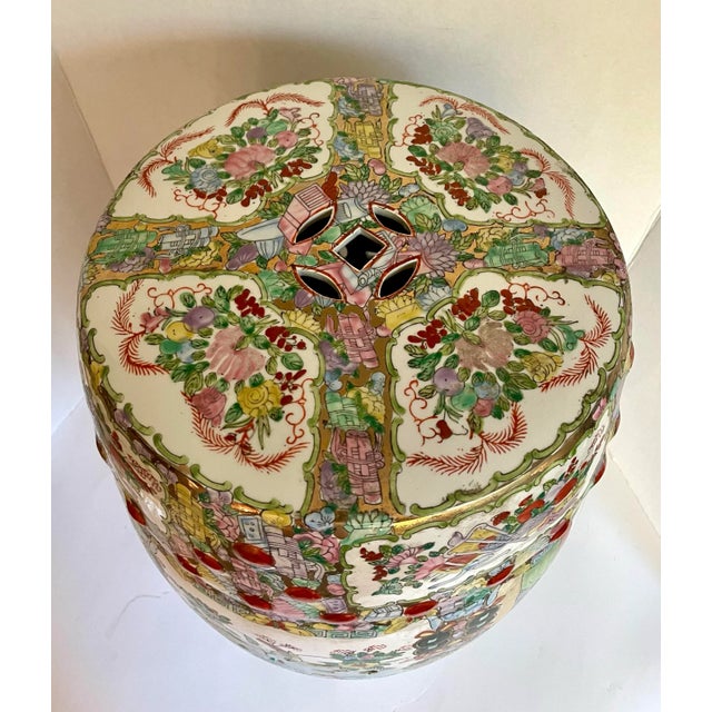 Here is a gorgeous porcelain garden stool made in the mid-later 20th c. featuring hand-painted family scenes, flowers,...