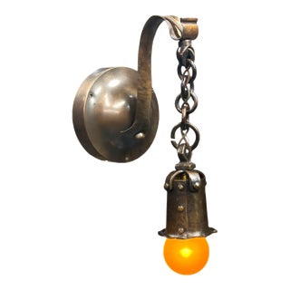 Hammered Exposed Bulb Arts and Crafts Wall Sconce in Patinated Bronze For Sale