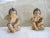 This is a Fabulous! Vintage Italian Pair of Cherubs in the Tuscan Style with a Antique Finish that have Dark Hair and...