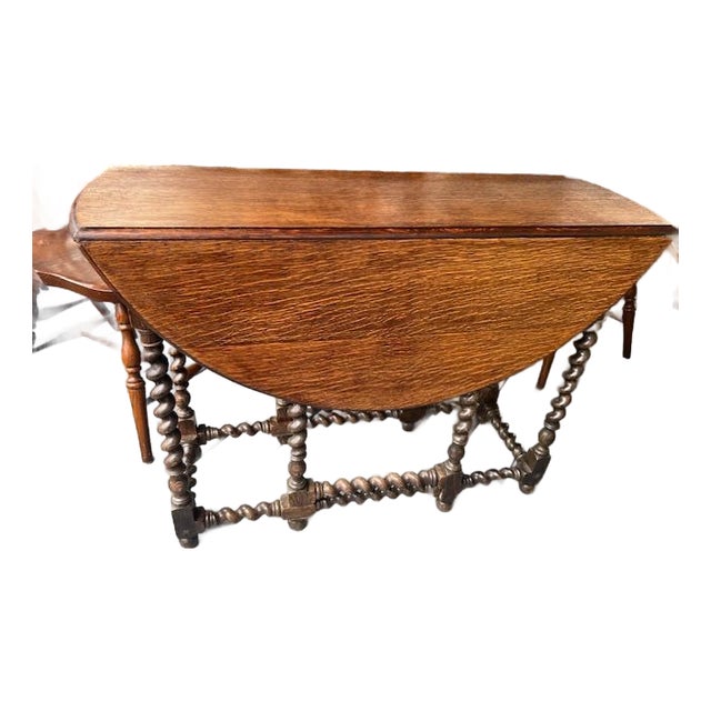 Share 1920s English Oak Drop-Leaf Dining Table With Barley Twist Gate-Legs For Sale