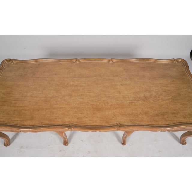Beautifully crafted by Judson Rothschild, this substantial Italian Rococo Revival coffee table captures the graceful...