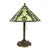 An antique Rainaud table lamp, crafted in the Bradley & Hubbard style, dating to approximately 1920. This lamp features a...