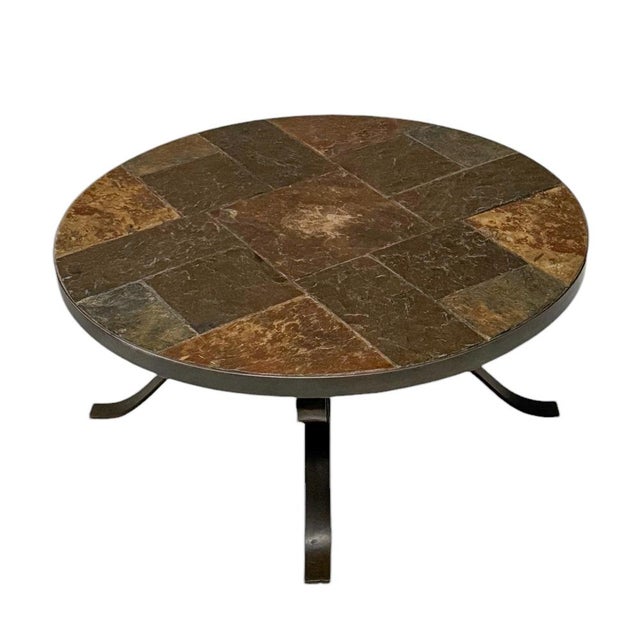 Stunning and elegant Brutalist coffee table or cocktail table. Striking Dutch design from the 1970s. Patinated wrought...