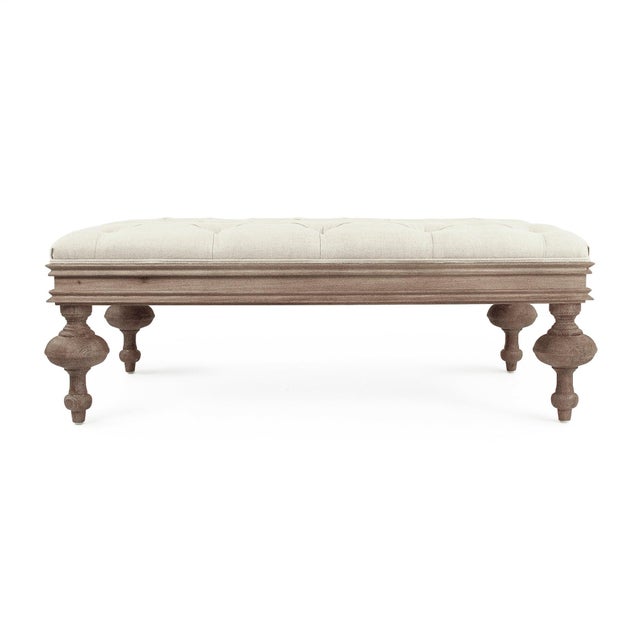 The Lara Tufted Ottoman from Zentique is a rectangular coffee table ottoman with a button-tufted natural linen top on...