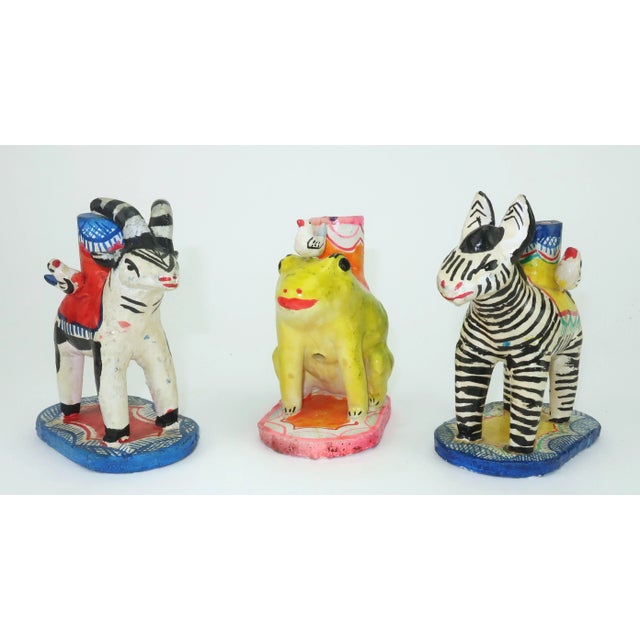 Set of three witty and whimsical animal shaped candle holders in the Mexican painted ceramic folk art tradition. They are...