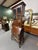 Beautiful vintage cherry Georgian Court Secretary desk by Ethan Allen. It features two-piece construction, beveled glass,...