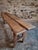 This French oak bench dates from the 1950s and features a simple and functional design typical of mid-20th century rural...