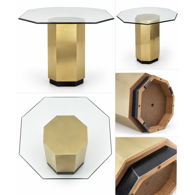 This vintage Postmodern dining or center table features a striking octagonal glass top supported by a faceted, mirror-clad...