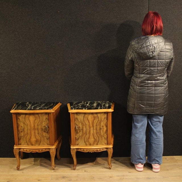 Pair of mid-20th-century Italian bedside tables. Carved and veneered in walnut, burl, and beech, these beautifully...