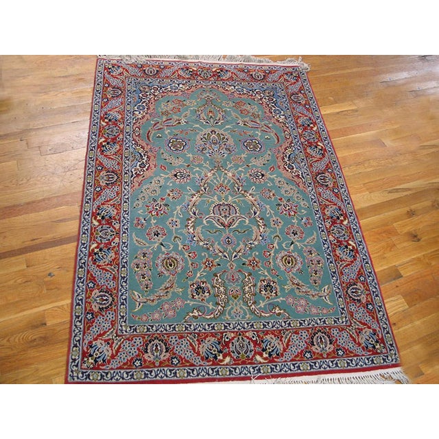 Antique Persian Isfahan rug, size: 3'8" x 5'6". Vintage Isfahan Small Scatter Size Wool Green Rug, Circa Date: 1960s. This...