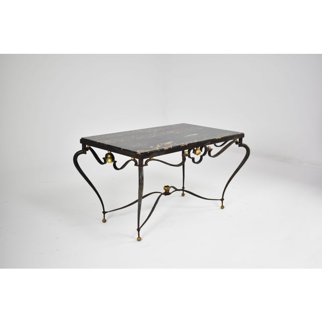 French Wrought Iron, Brass and Portoro Marble Coffee Table Attributed to René Drouet, France, circa 1945 A coffee table...