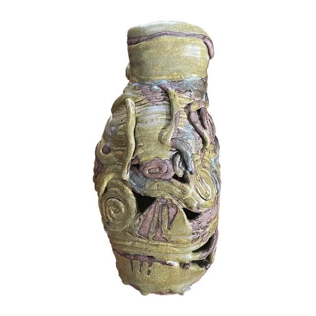 This vintage mid-century art pottery studio vase is a stunning piece for any collector of abstract or brutalist art. The...