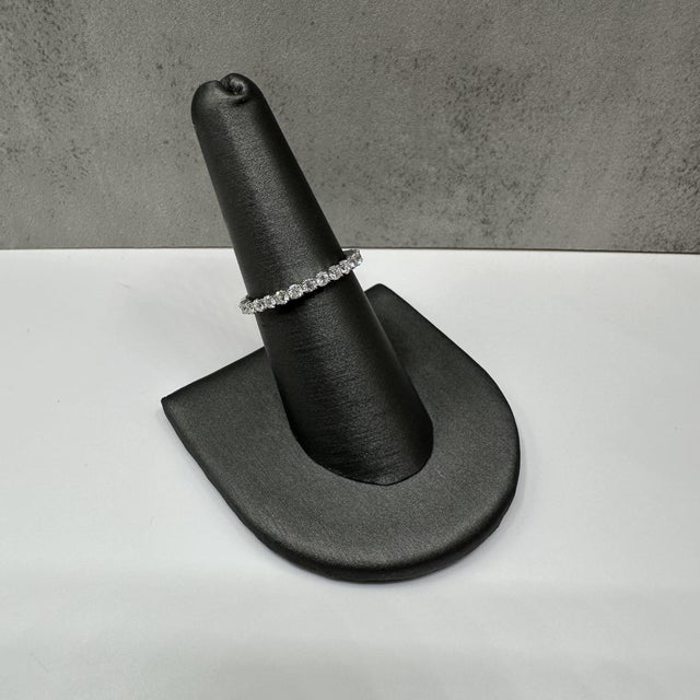 This stunning Diamond Half Eternity Ring in 14kt white gold features a dazzling 0.50ctw of natural GH SI round diamonds,...