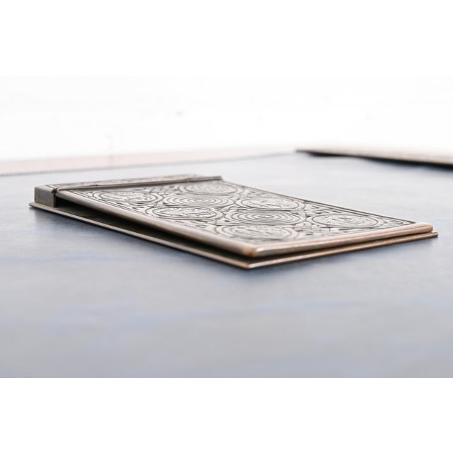 A gorgeous Arts & Crafts period "Zodiac" pattern bronze notepad holder By Tiffany Studios New York, USA, Early 20th...