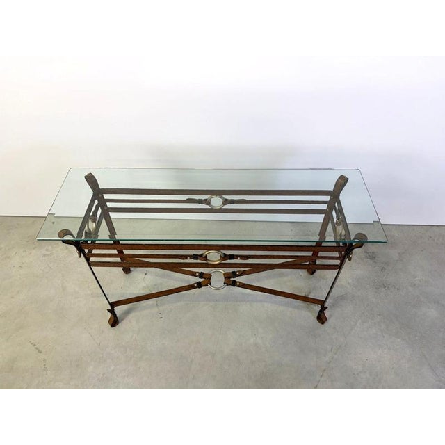 This amazing late 20th century faux leather metal console table with glass top has all the signature details as per Hermes...