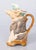 A superb antique French majolica barbotine pig waiter pitcher by Onnaing, circa 1880. This delightful pitcher is designed...