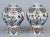 Pair of early delft octagonal and ribbed vases, polychrome decorated in iron red, blue and green with birds perched on...