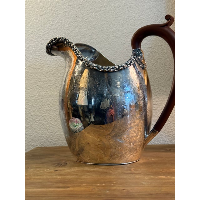Antique silver pitcher - Ellis Baker made in Sheffield England. All shine up looking pretty. 9” wide by 9” tall